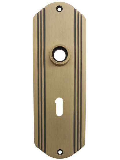 Streamline Deco Forged Brass Back Plate With Keyhole in Antique Brass.